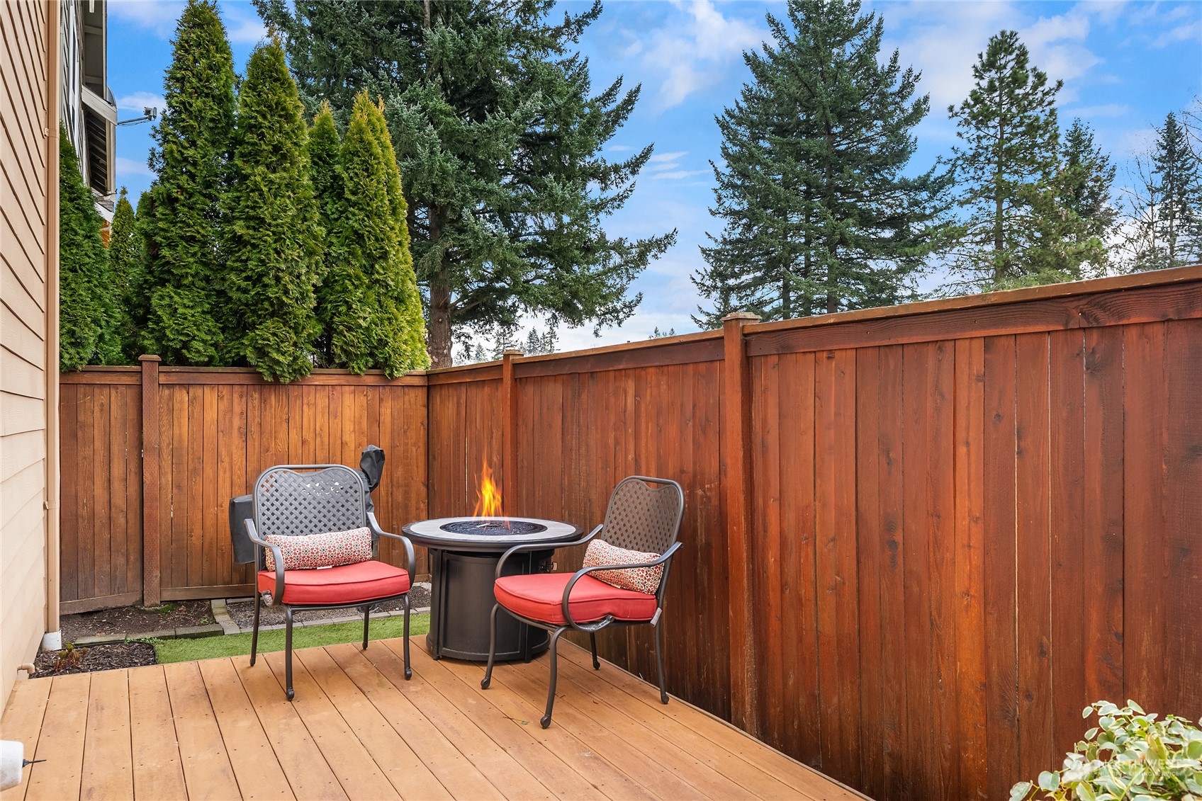 818 235th Place Southeast Bothell, WA 98021 - Photo 16 of 31 an outdoor sitting area with furniture and wooden floor