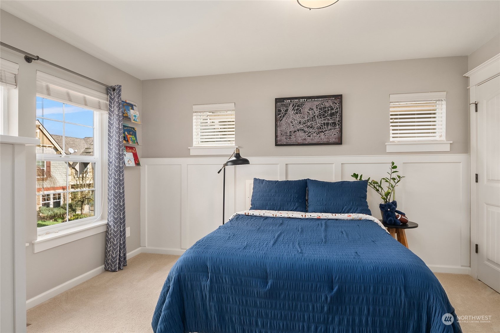 818 235th Place Southeast Bothell, WA 98021 - Photo 25 of 31 a bed sitting in a bedroom next to a window