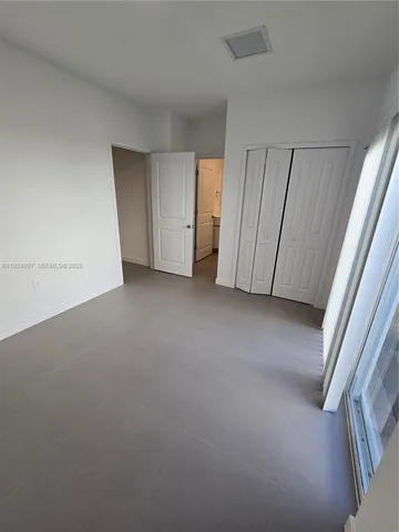 an empty room with a door