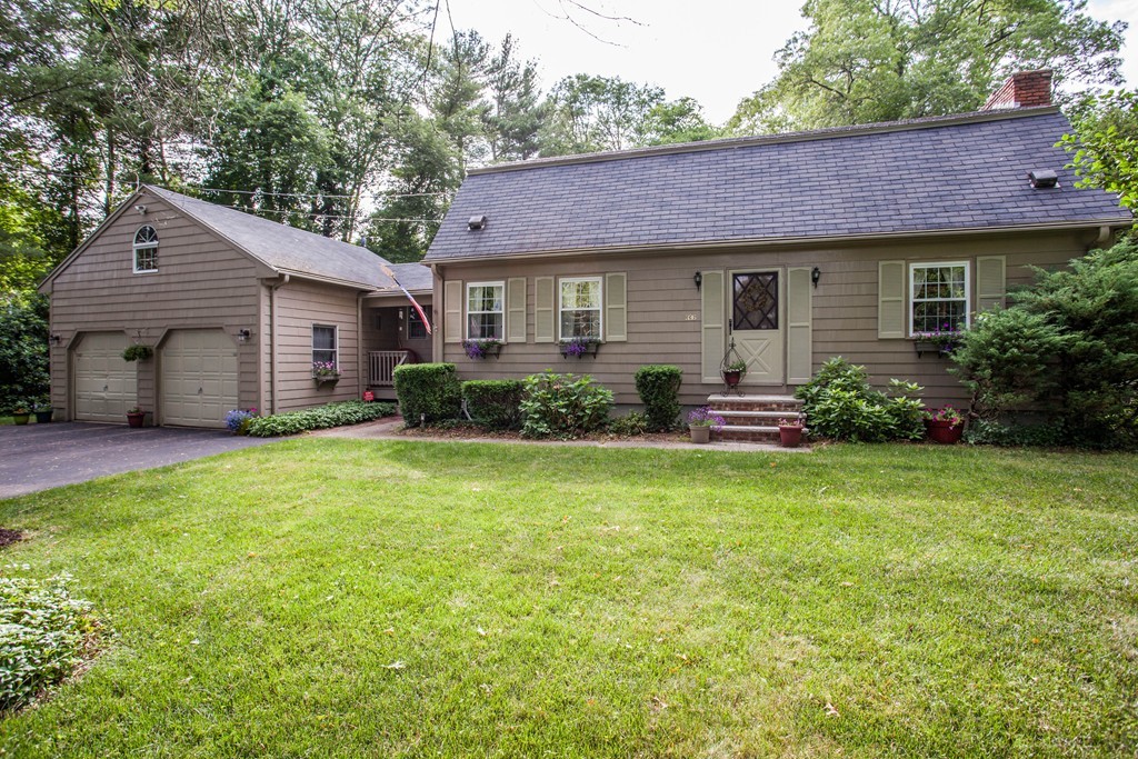 336 Mendall Road Acushnet, MA 02743 - Photo 1 of 30 a front view of a house with garden