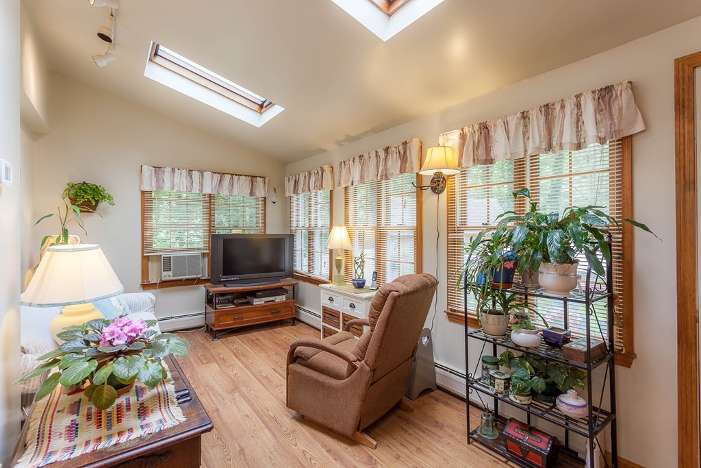 336 Mendall Road Acushnet, MA 02743 - Photo 9 of 30 a living room with furniture and a flat screen tv