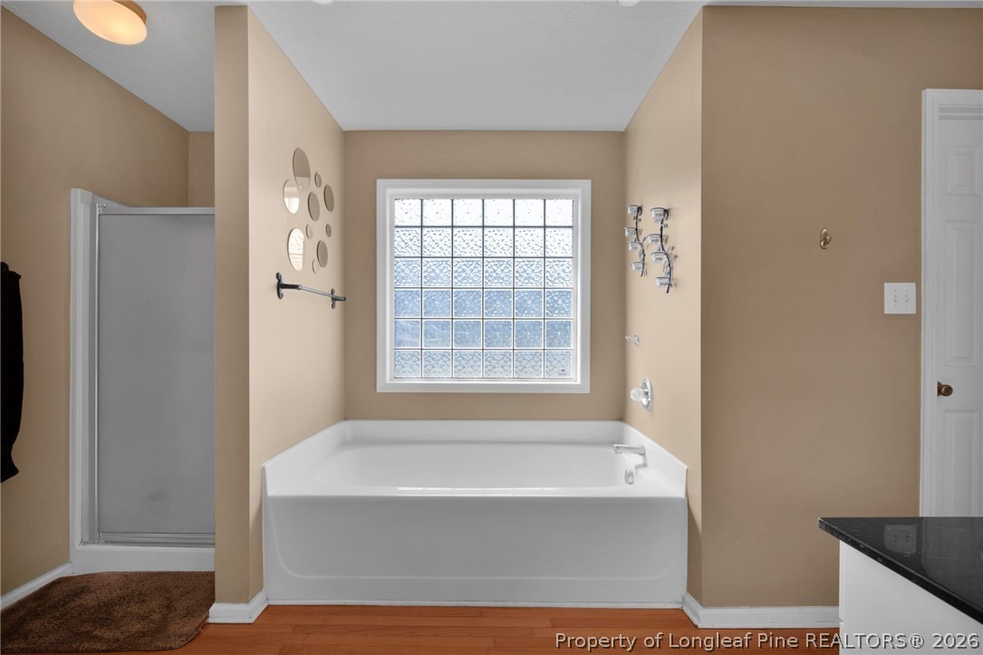 73 Timberlake Drive Clinton, NC 28328 - Photo 23 of 37 a bathroom with a bathtub and shower