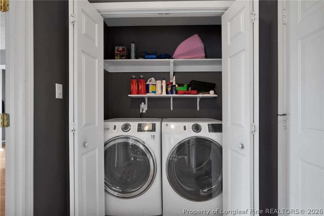 73 Timberlake Drive Clinton, NC 28328 - Photo 26 of 37 a utility room with dryer and washer