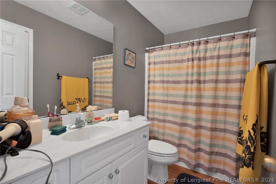 73 Timberlake Drive Clinton, NC 28328 - Photo 29 of 37 a bathroom with a sink toilet and shower