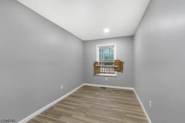 a view of an empty room and window