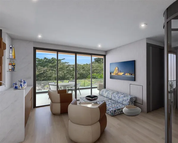 a room with furniture and a large window