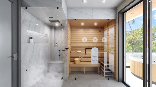 a bathroom with a bathtub and a window