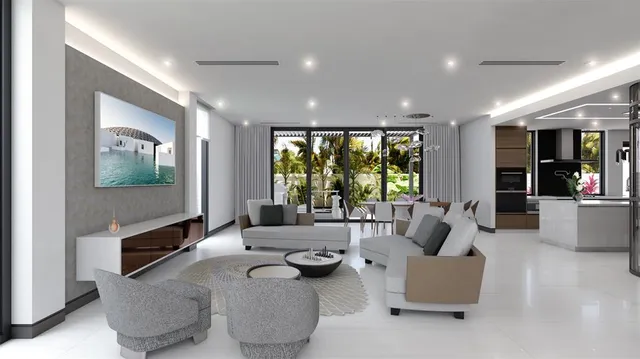 a living room with fireplace furniture and a large window