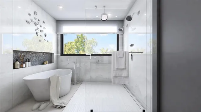 a bathroom with a bathtub and a shower