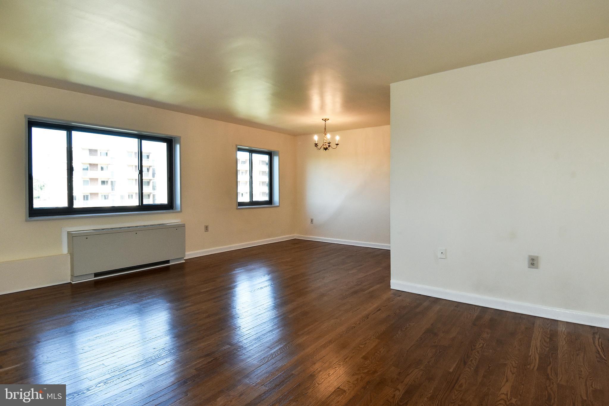 1200 South Arlington Ridge Road, Unit 703 Arlington, VA 22202 - Photo 12 of 38 Living Room to Dining Area