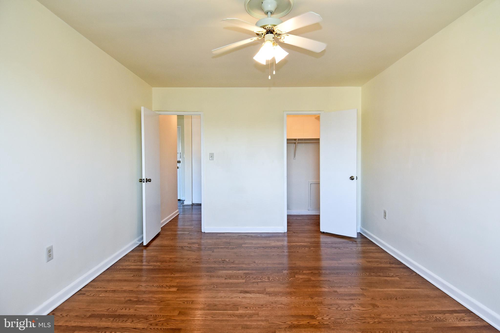 1200 South Arlington Ridge Road, Unit 703 Arlington, VA 22202 - Photo 23 of 38 Bedroom with Walk-in Closet