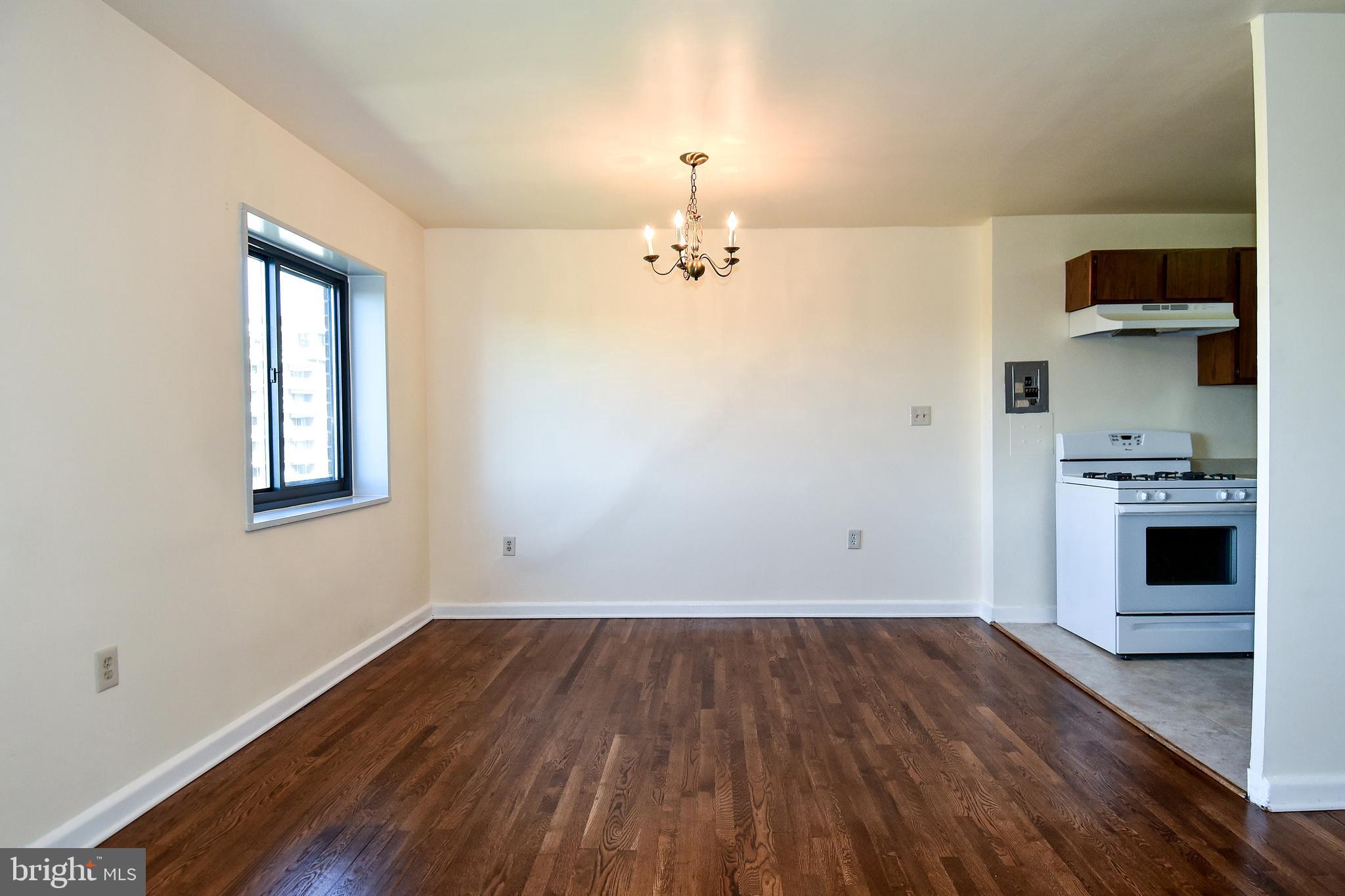 Dining Area with peek of kitchn