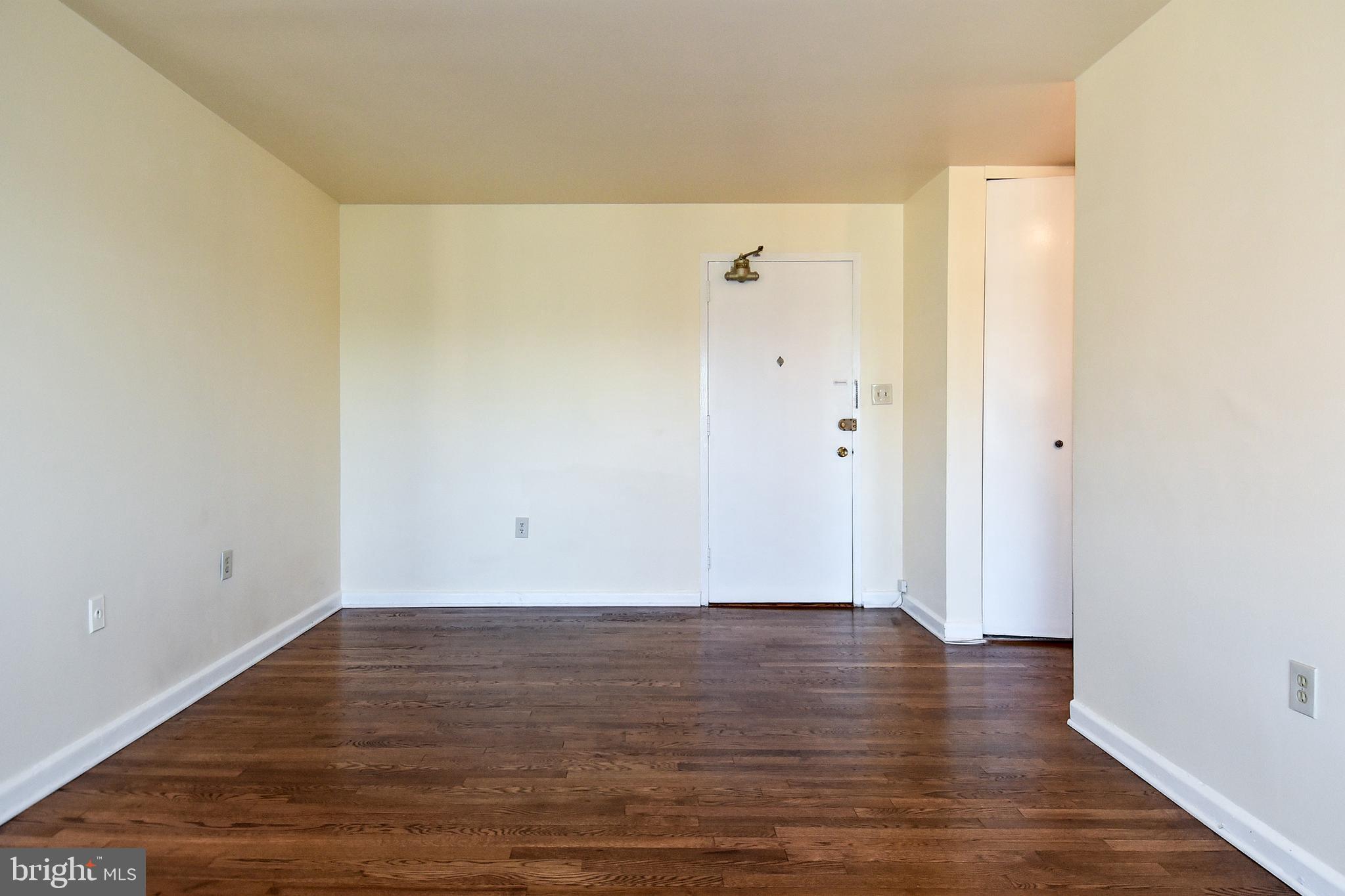 1200 South Arlington Ridge Road, Unit 703 Arlington, VA 22202 - Photo 10 of 38 Entryway and Living Room