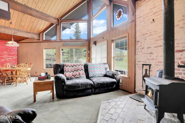 a kitchen with stainless steel appliances granite countertop a stove and a sink