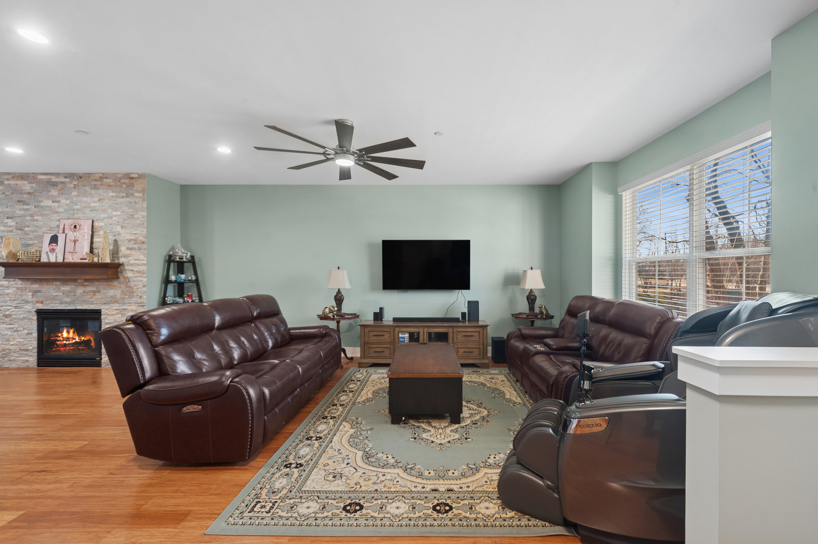 1772 Lancaster Way Northbrook, IL 60062 - Photo 5 of 26 a living room with furniture and a flat screen tv