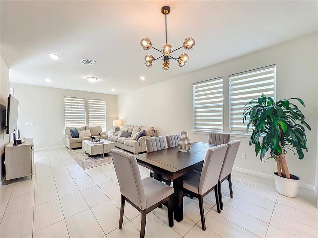 10976 Leafshore Loop Orlando, FL 32829 - Photo 18 of 70 a living room with furniture