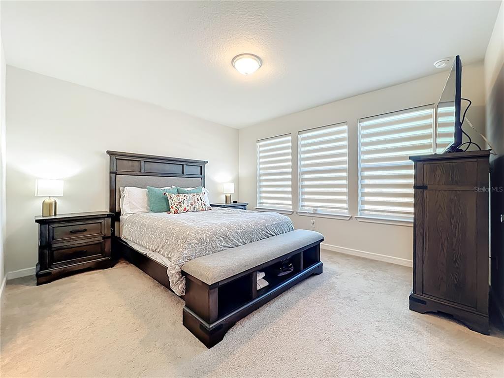10976 Leafshore Loop Orlando, FL 32829 - Photo 42 of 70 a bed room with a bed and a window