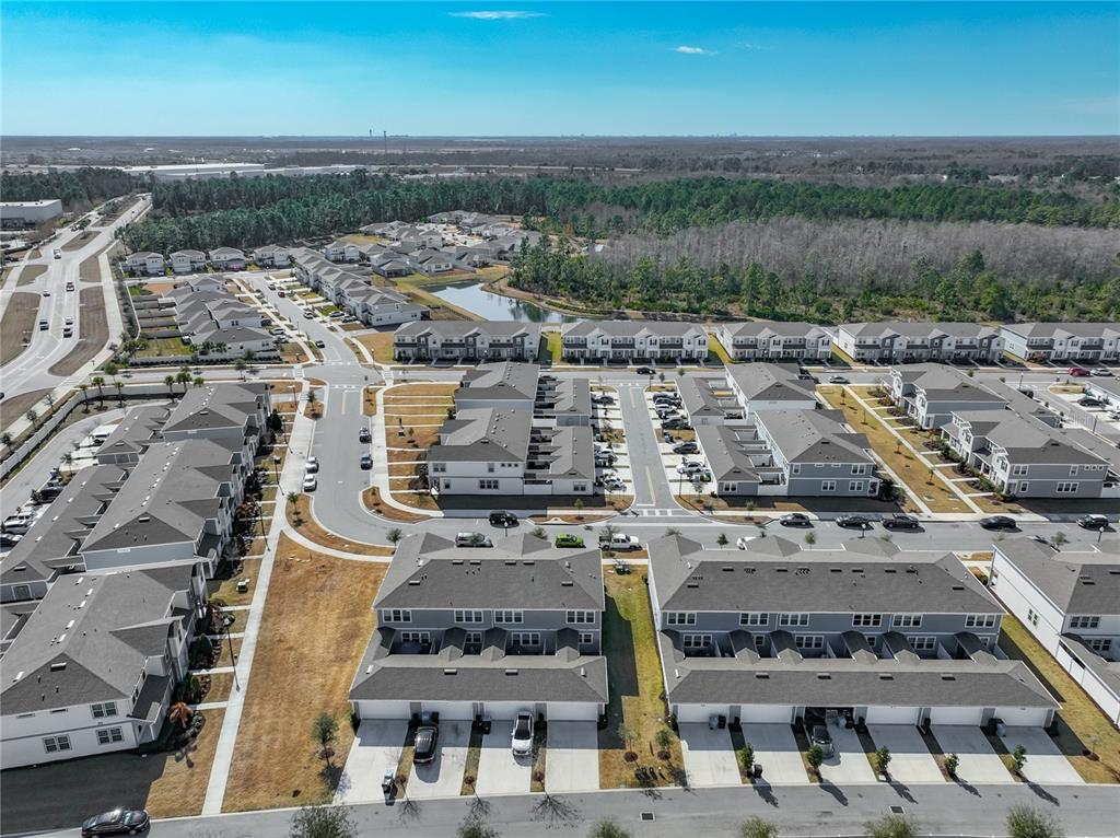 10976 Leafshore Loop Orlando, FL 32829 - Photo 70 of 70 an aerial view of a building with outdoor space