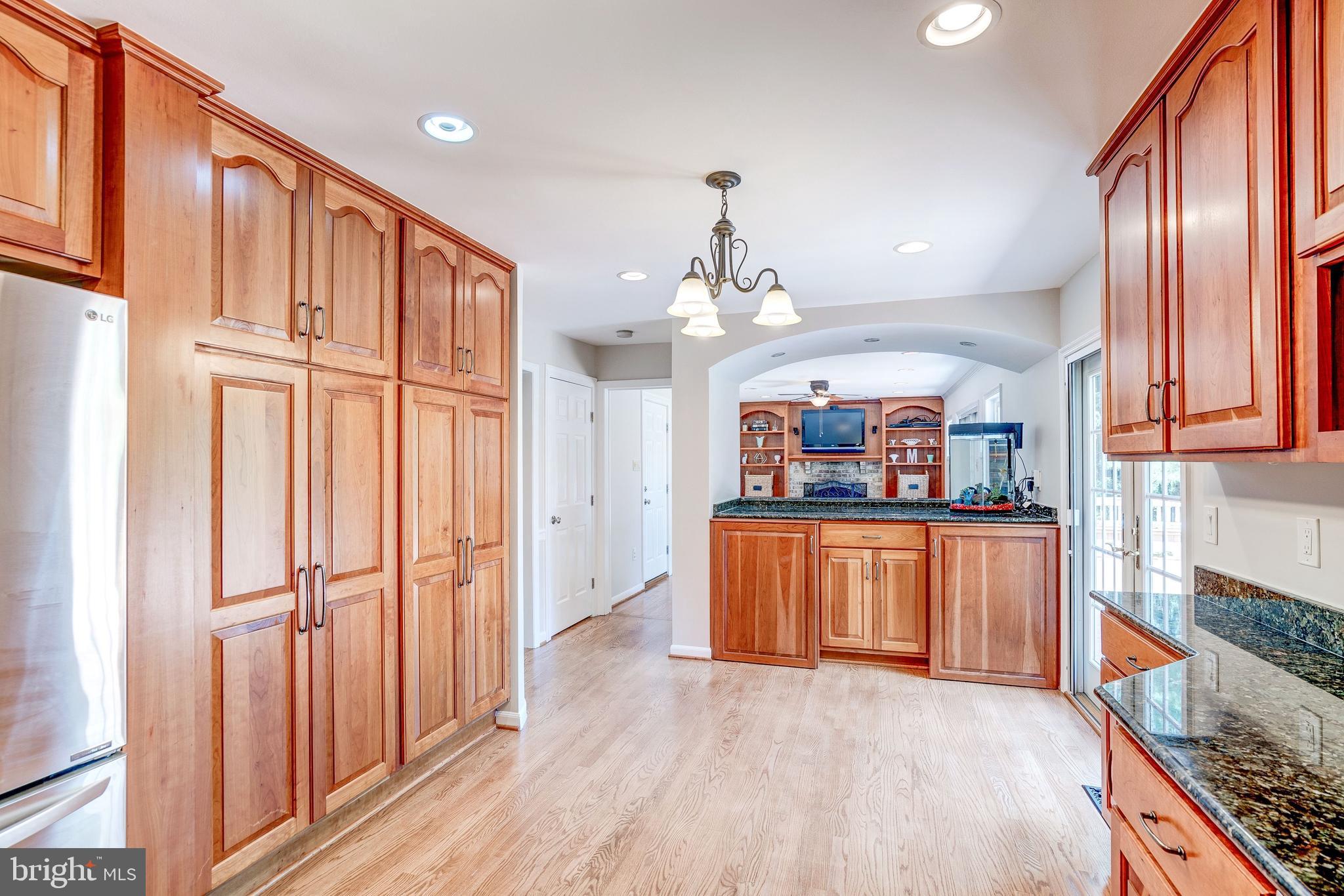 921 Riva Ridge Drive Great Falls, VA 22066 - Photo 16 of 44 great storage in wall of pantry cupboards