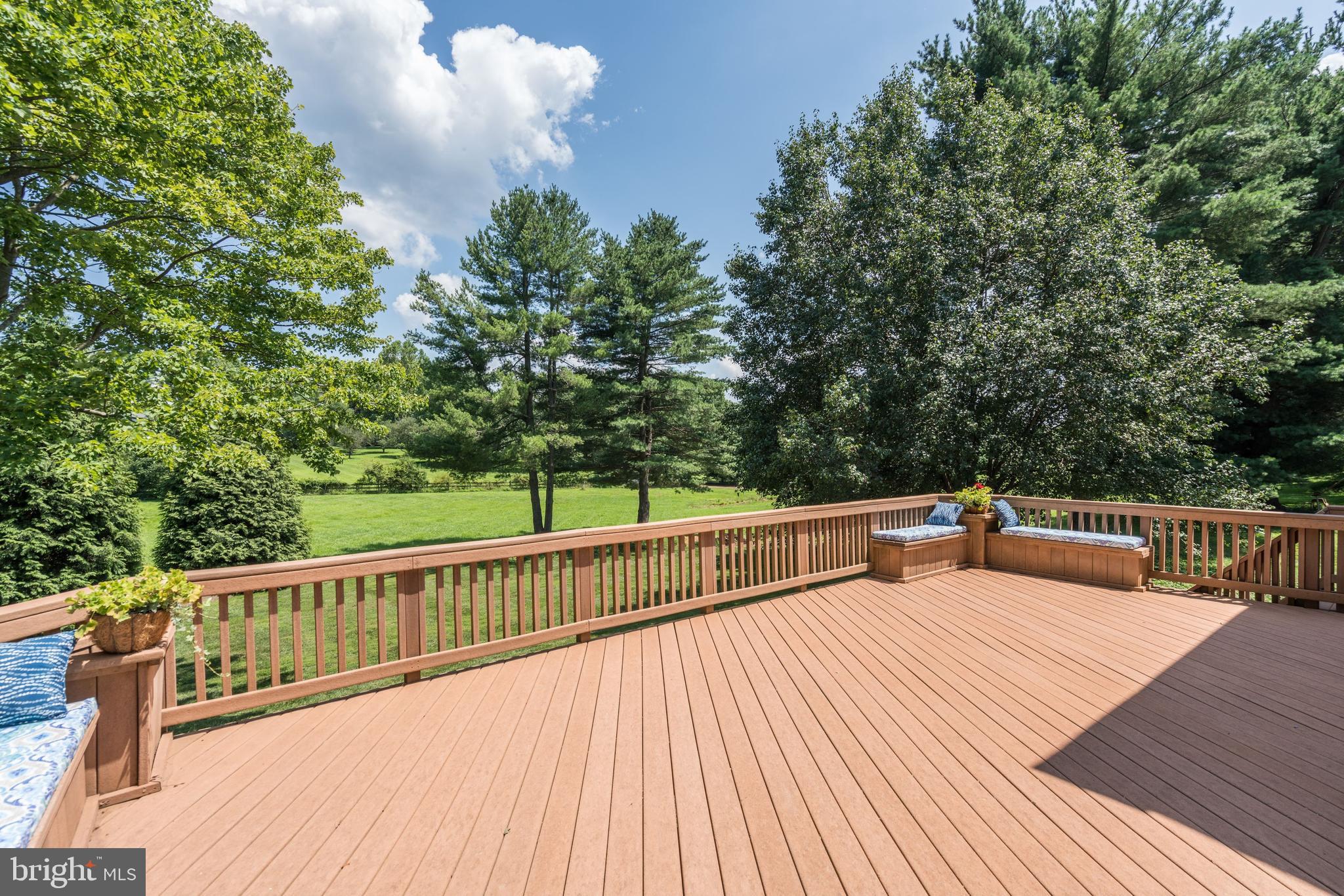 921 Riva Ridge Drive Great Falls, VA 22066 - Photo 21 of 44 family room opens to deck and expands space