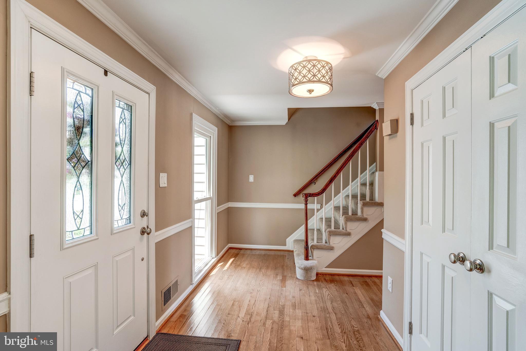 921 Riva Ridge Drive Great Falls, VA 22066 - Photo 23 of 44 warm wood floors on main and carpet upstairs