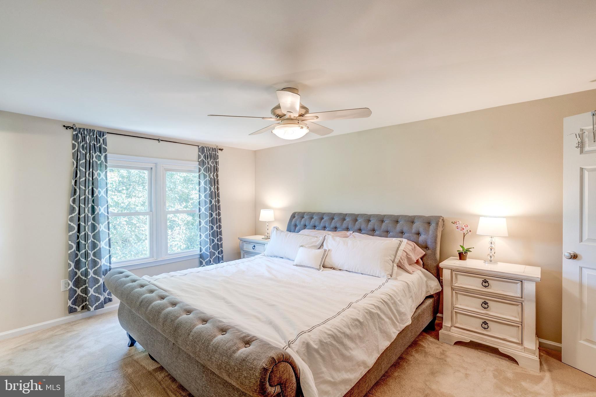 921 Riva Ridge Drive Great Falls, VA 22066 - Photo 24 of 44 master bedroom has peaceful views of lawn, garden