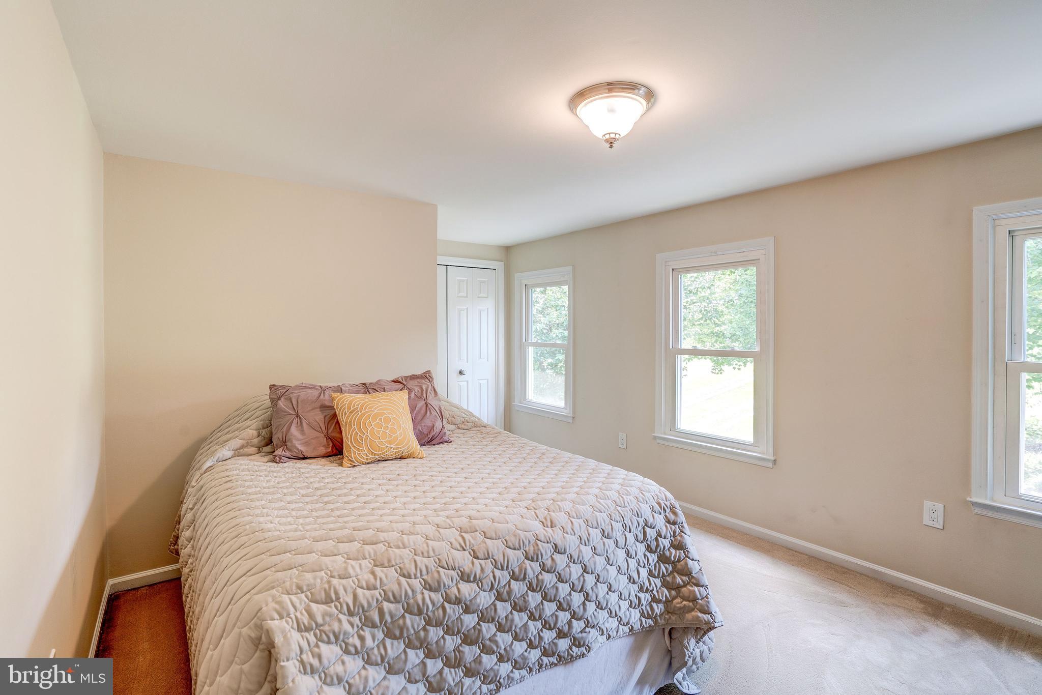 921 Riva Ridge Drive Great Falls, VA 22066 - Photo 28 of 44 private second bedroom with triple windows
