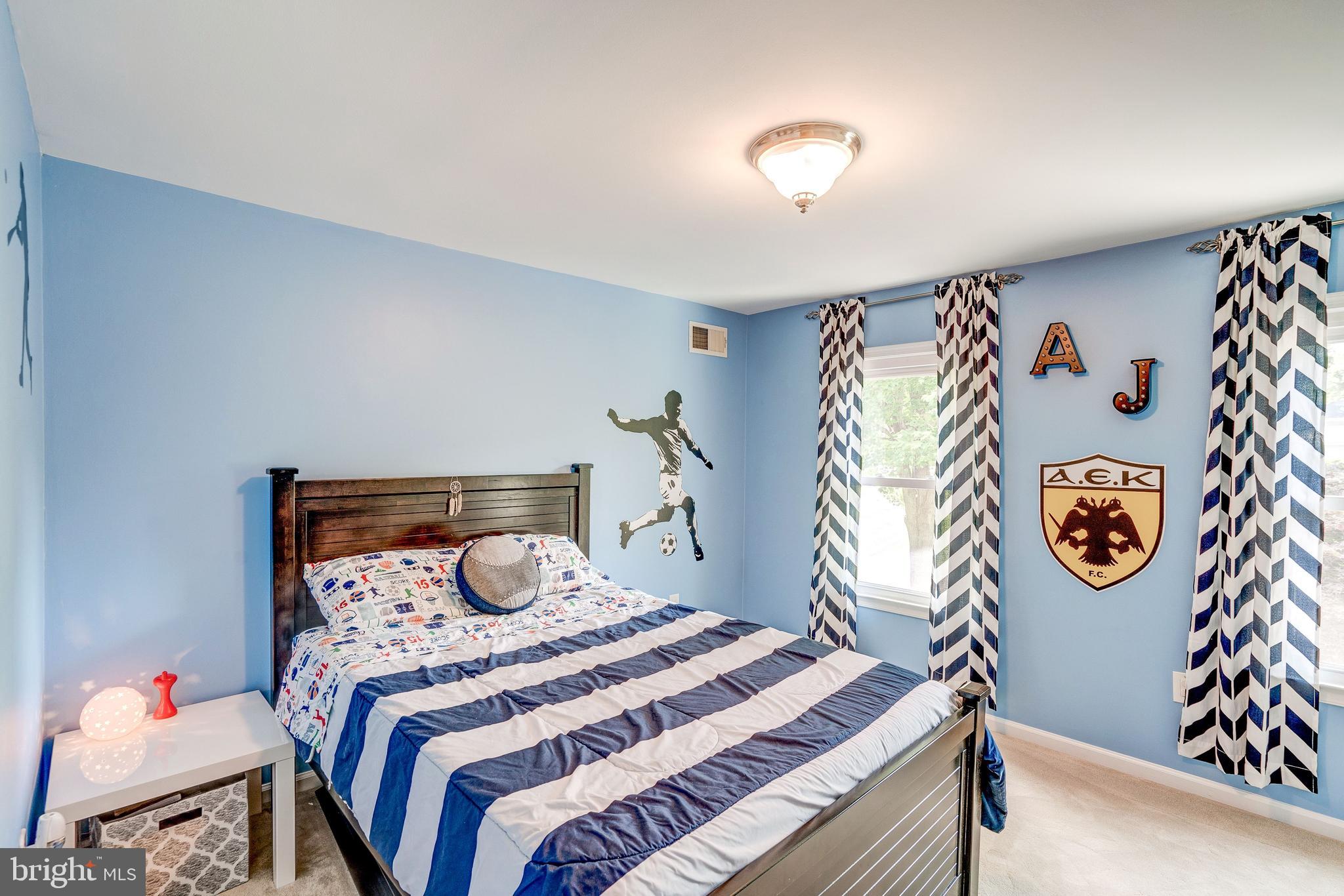 921 Riva Ridge Drive Great Falls, VA 22066 - Photo 31 of 44 soccer themed third bedroom