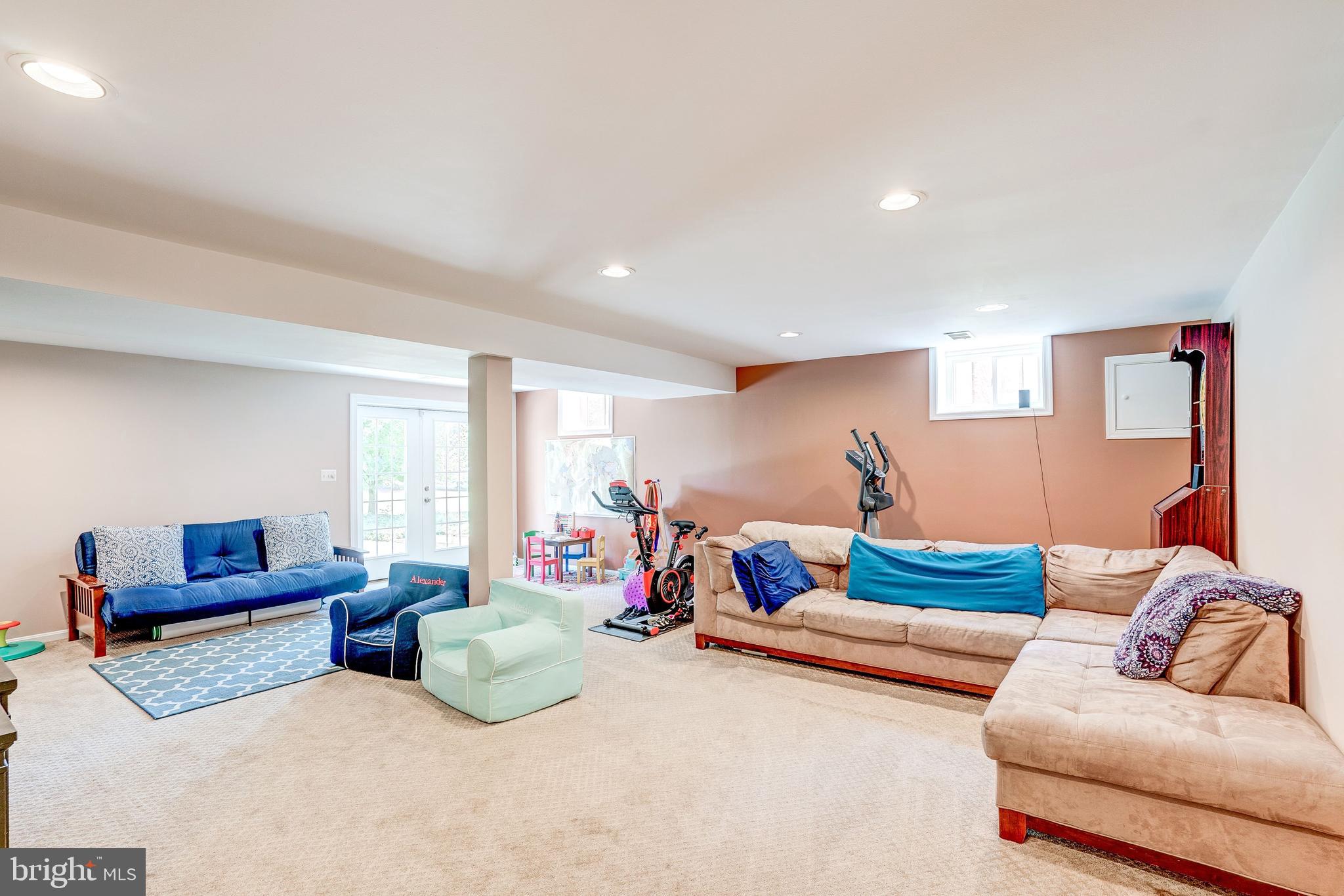 921 Riva Ridge Drive Great Falls, VA 22066 - Photo 35 of 44 Big L shaped rec room for media, play, sports, gym