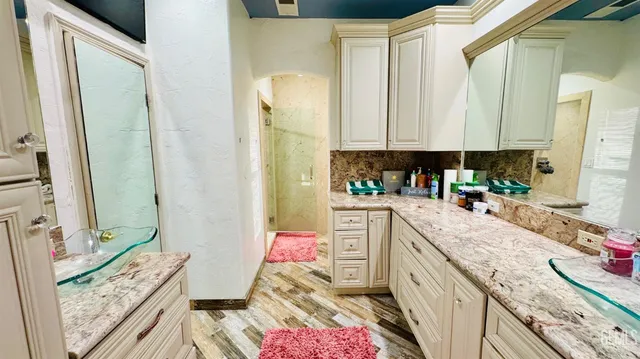 a kitchen with a sink stove and refrigerator