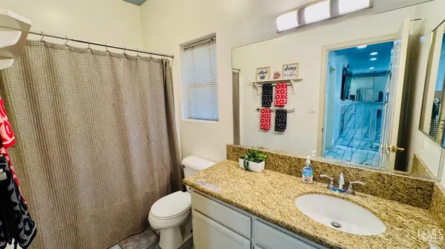 a bathroom with a toilet