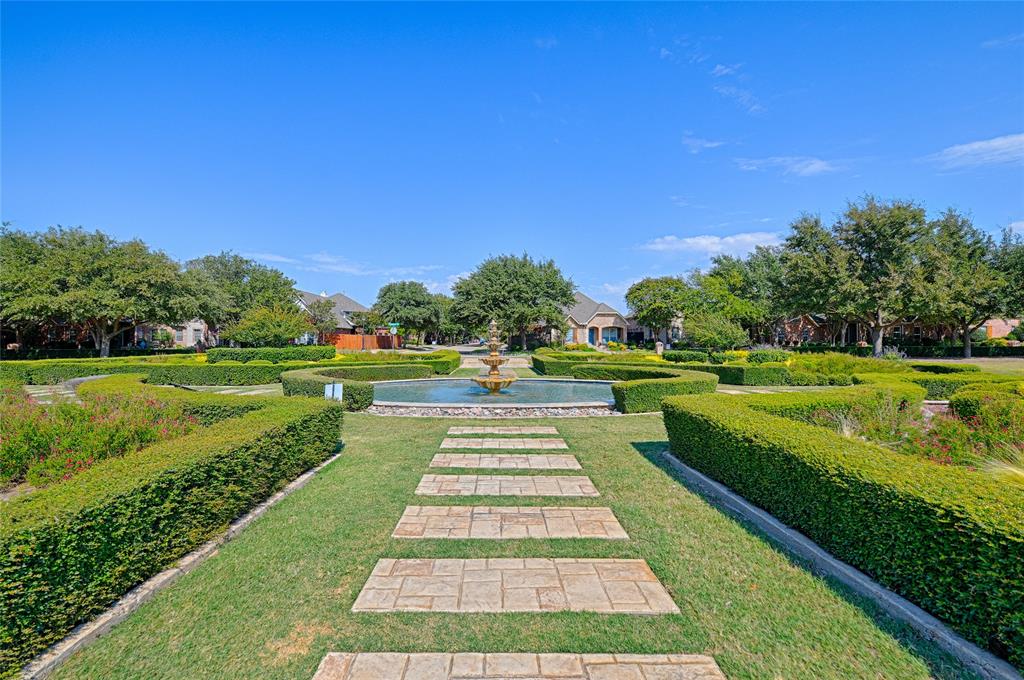 7681 Glasshouse Walk Frisco, TX 75035 - Photo 27 of 28 a view of green field with sitting area