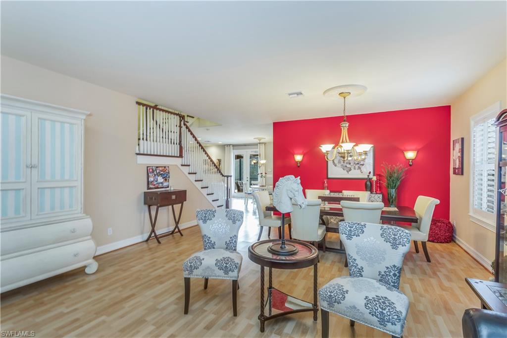 3305 Guilford Road Naples, FL 34112 - Photo 3 of 20 Great room and dining room shot.
