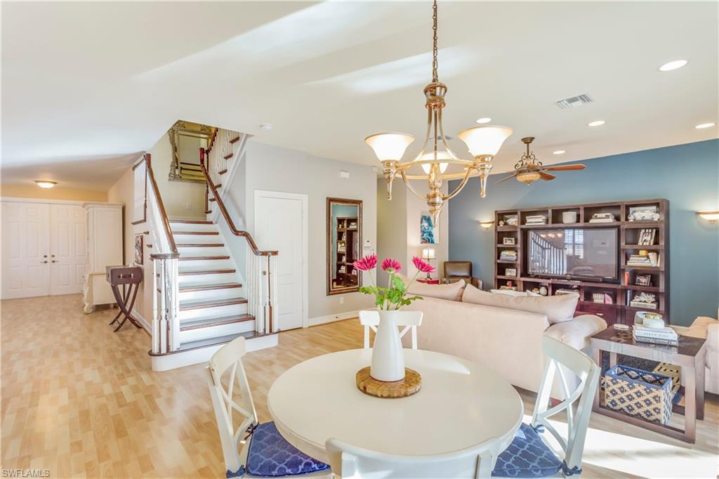 3305 Guilford Road Naples, FL 34112 - Photo 7 of 20 Charming shot of family room. Look at that appealing stairwell.