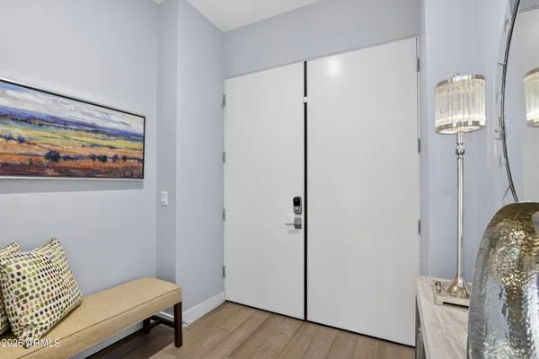 a bedroom with a bed and a couch