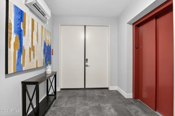 a view of an entryway with a window