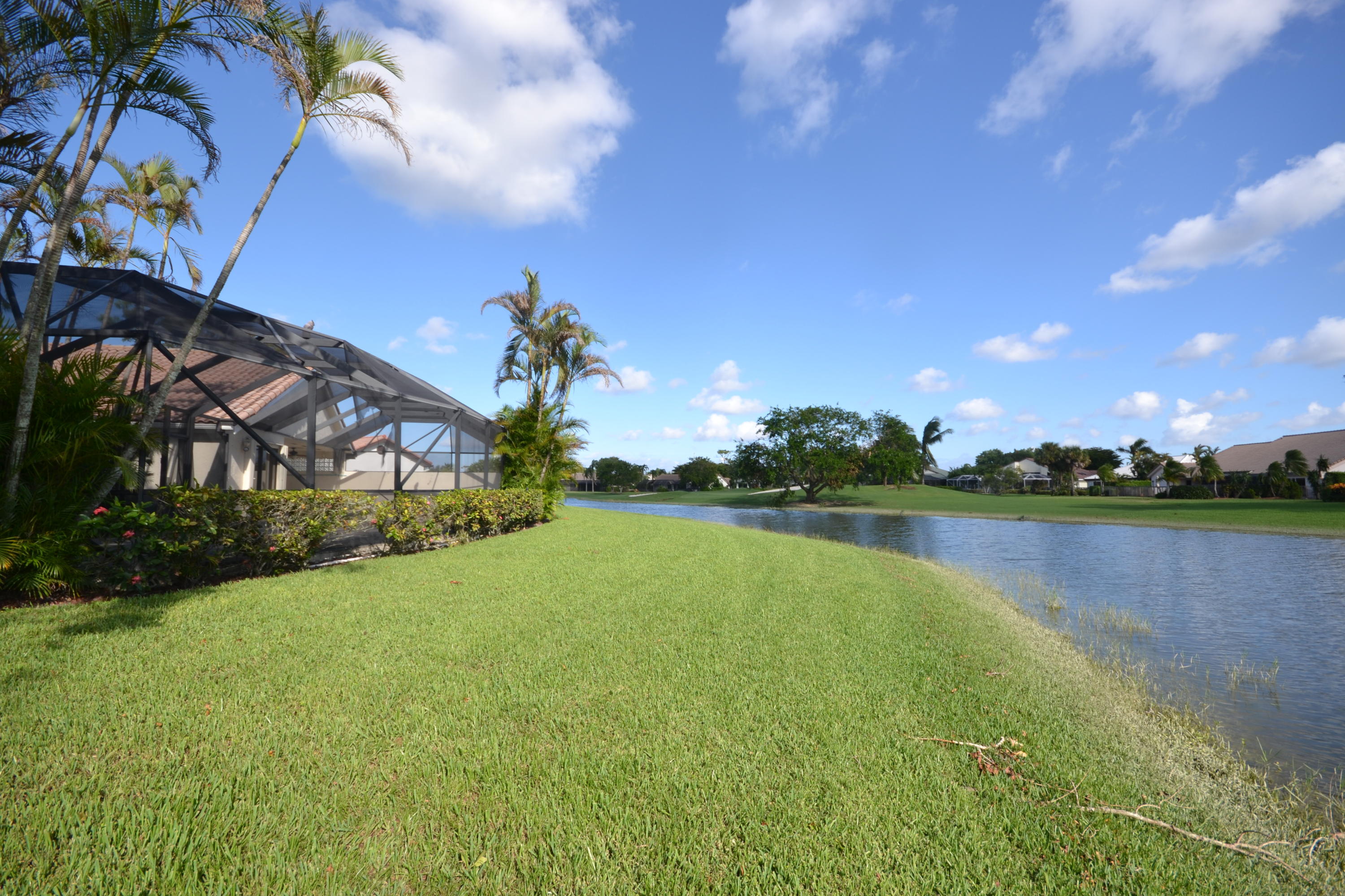 10176 Sunset Bend Drive Boca Raton, FL 33428 - Photo 3 of 41 Back yard & Waterfront + Golf Views