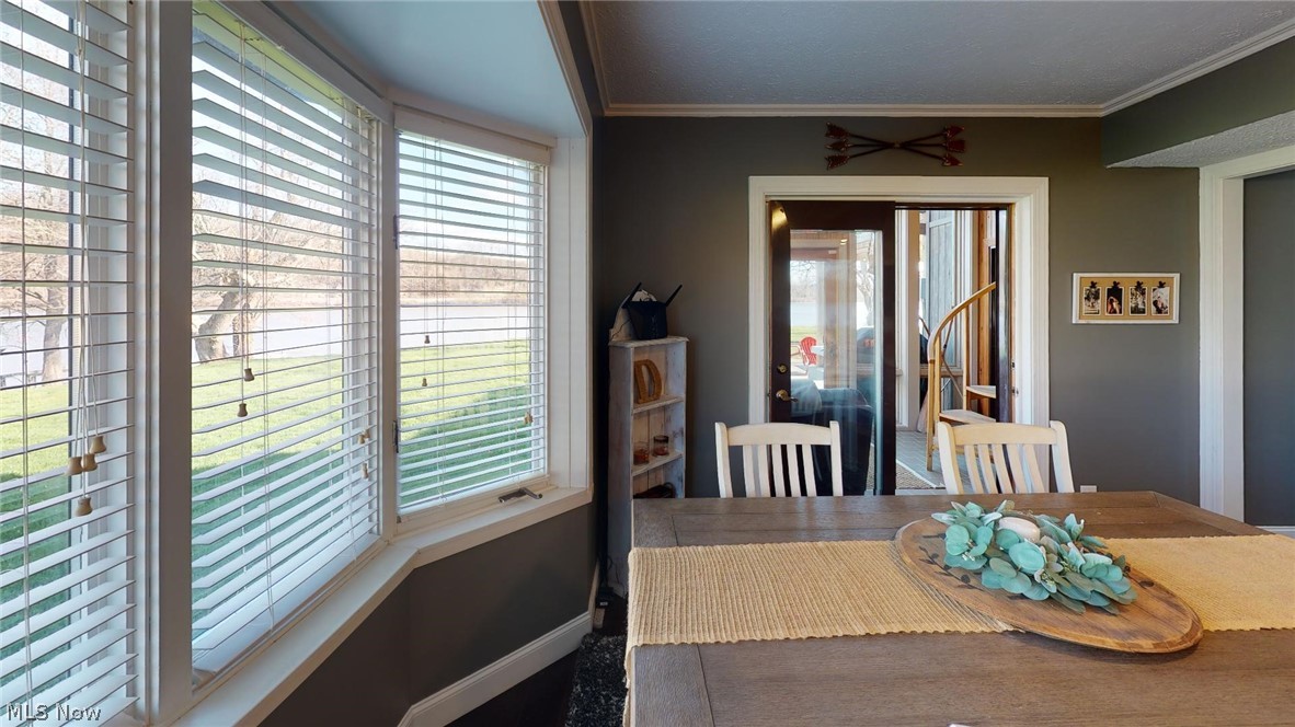 650 Riverfront Road Coolville, OH 45723 - Photo 16 of 30 lots of natural light in the dining room
