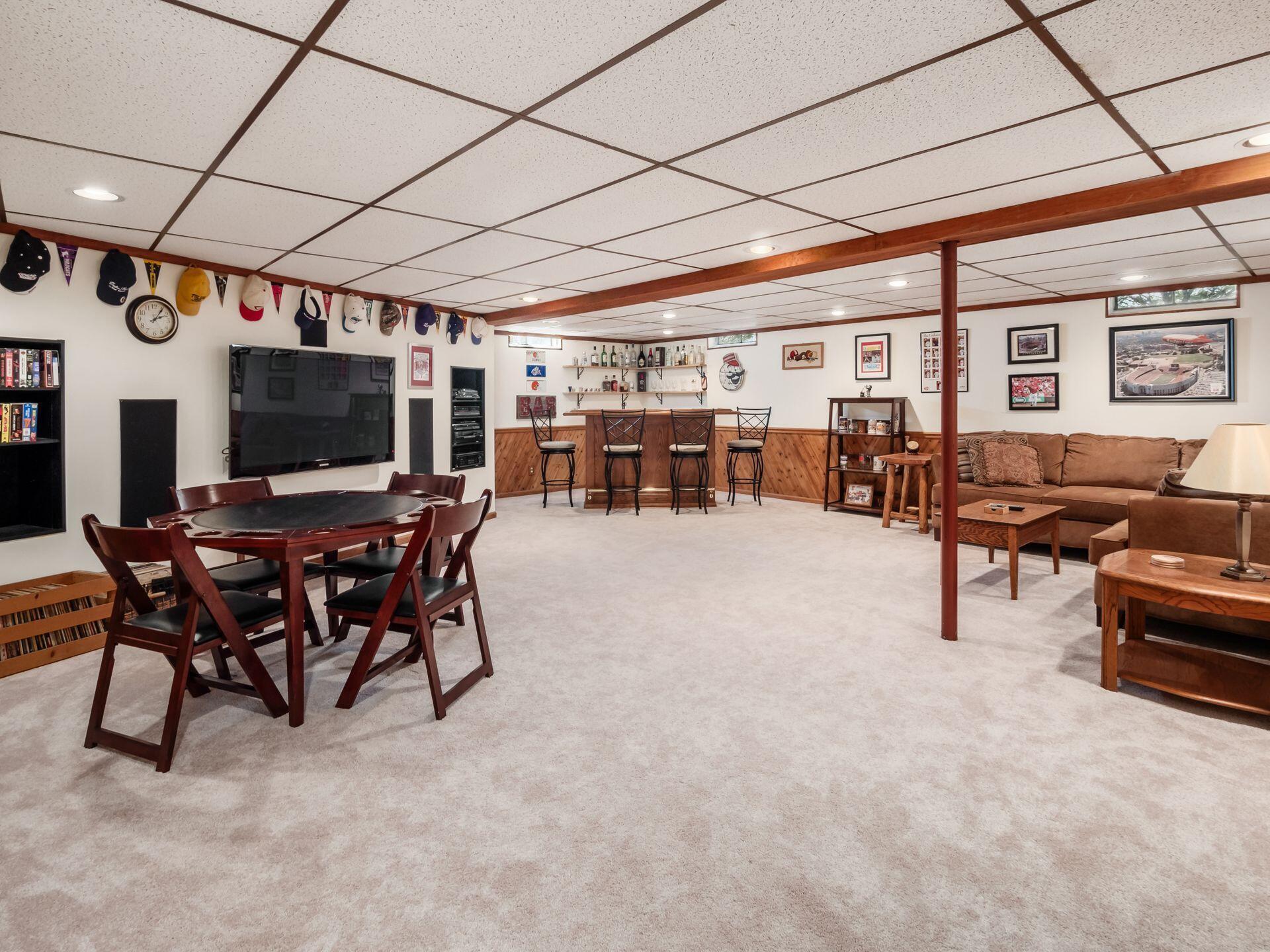 12741 Goodman Road Ashville, OH 43103 - Photo 28 of 61 The full finished basement includes a built-in TV and tons of room for entertaining!