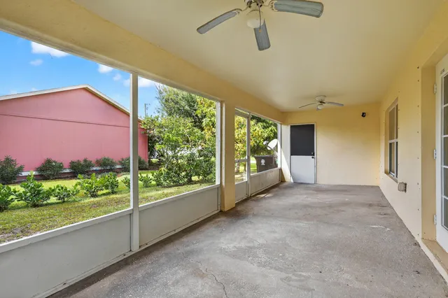 a view of a room with a large window