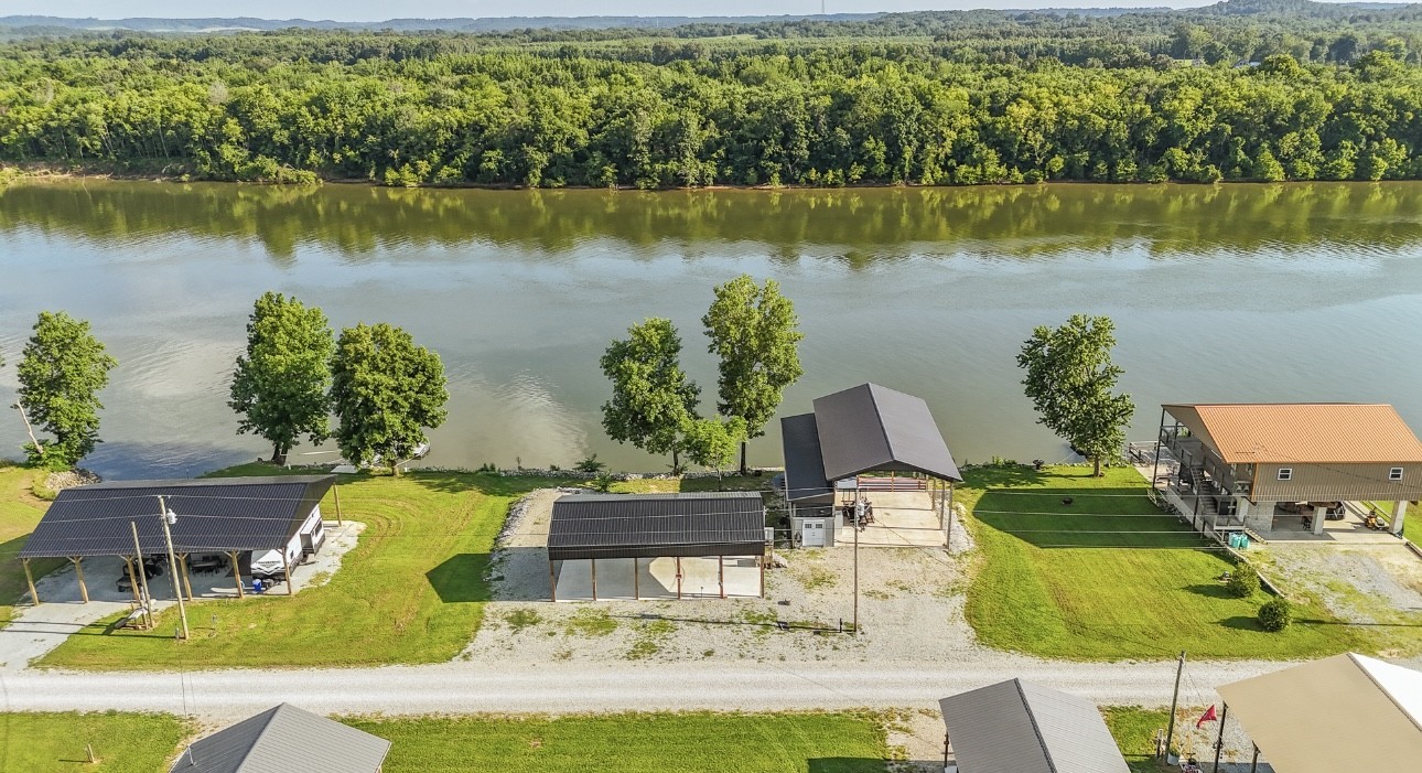 a view of a swimming pool with a lake view