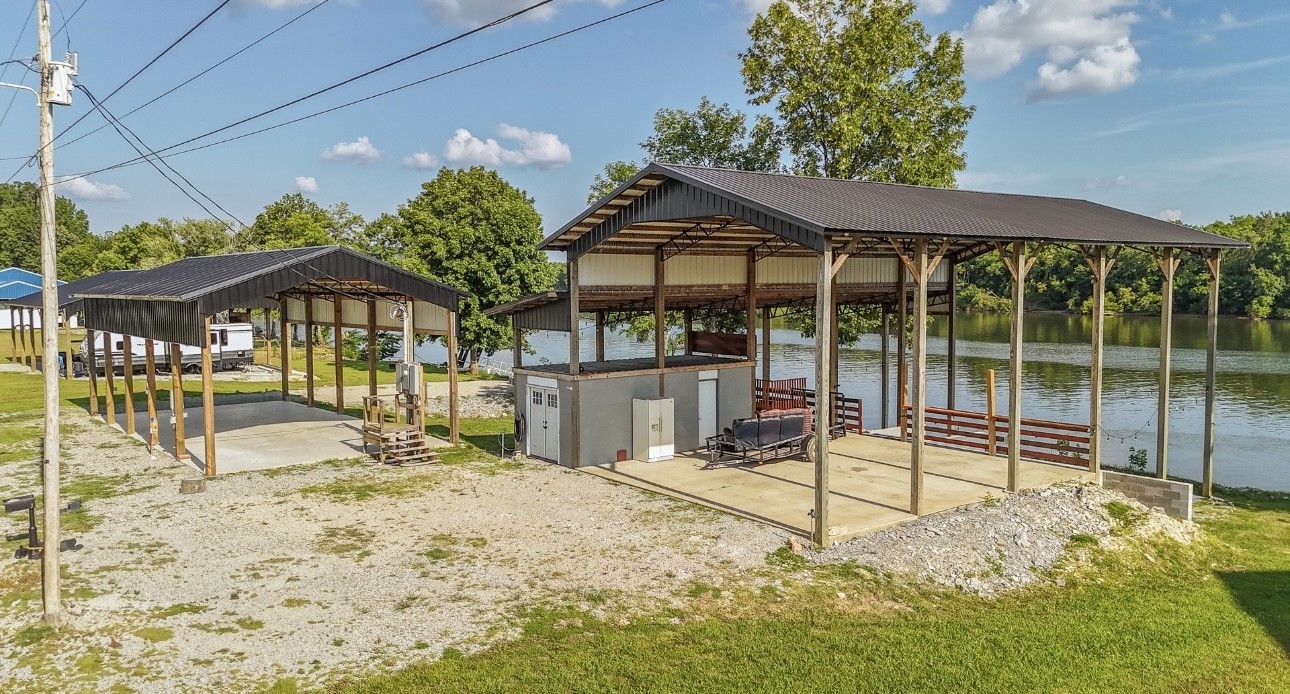 1085 WC PICKETT Road Clifton, TN 38425 - Photo 19 of 72 a view of a swimming pool with a patio
