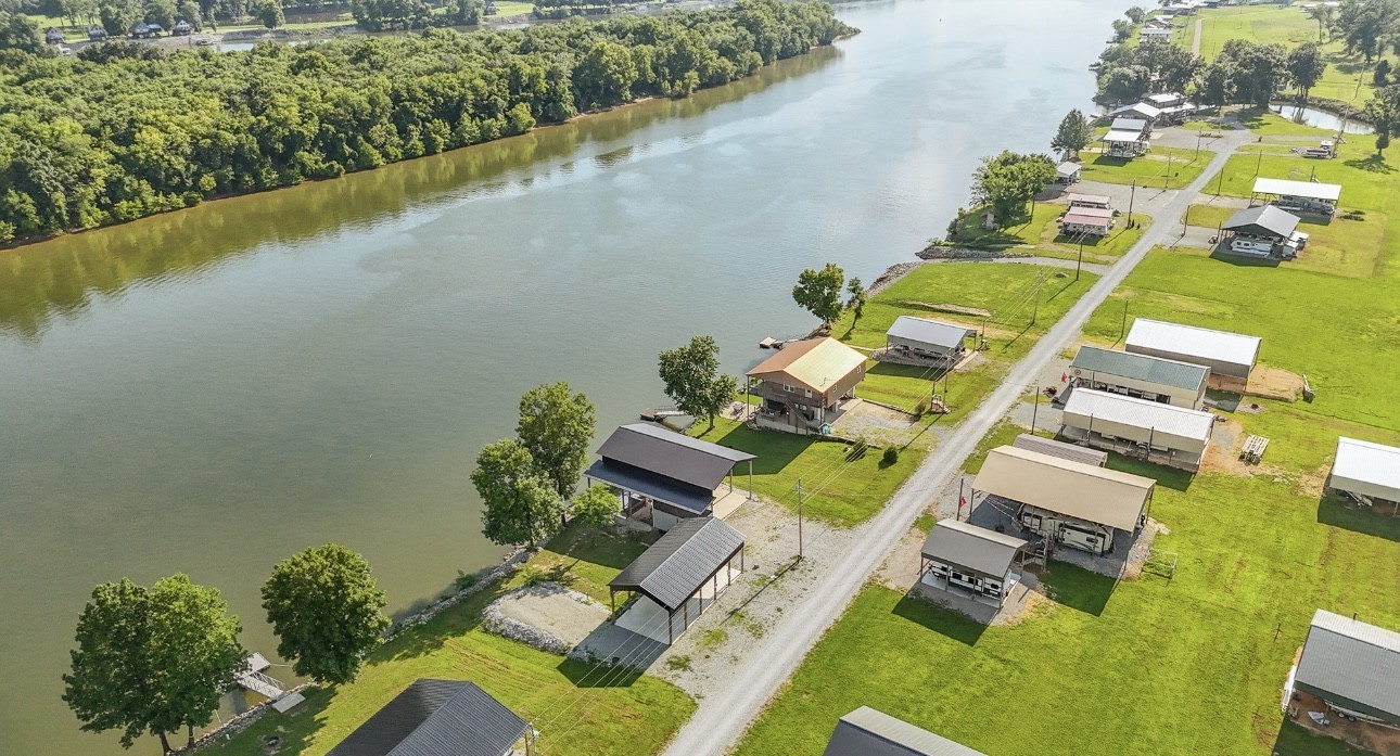 1085 WC PICKETT Road Clifton, TN 38425 - Photo 23 of 72 an aerial view of a house with a ocean view