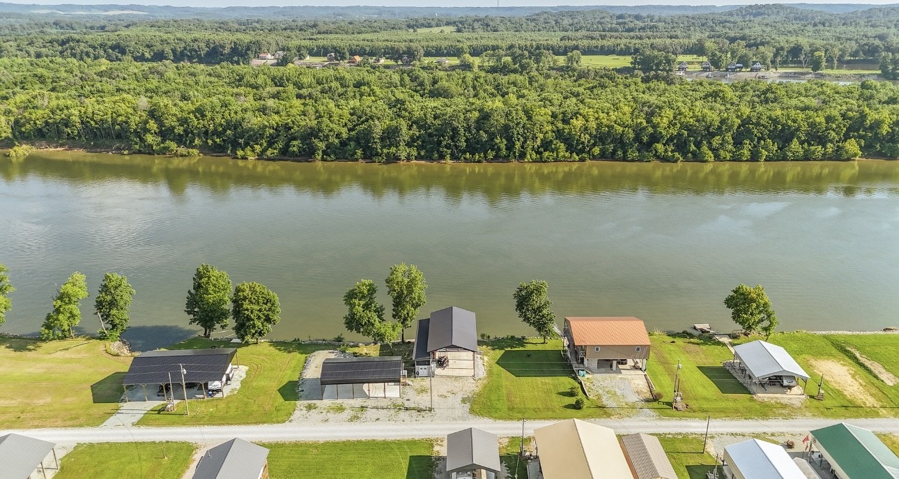 1085 WC PICKETT Road Clifton, TN 38425 - Photo 28 of 72 a view of a swimming pool with a yard