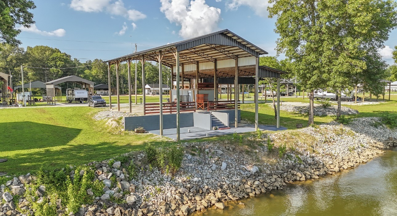 1085 WC PICKETT Road Clifton, TN 38425 - Photo 35 of 72 a view of a house with backyard and sitting area