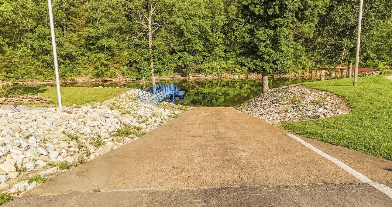 1085 WC PICKETT Road Clifton, TN 38425 - Photo 40 of 72 a view of a backyard of the house