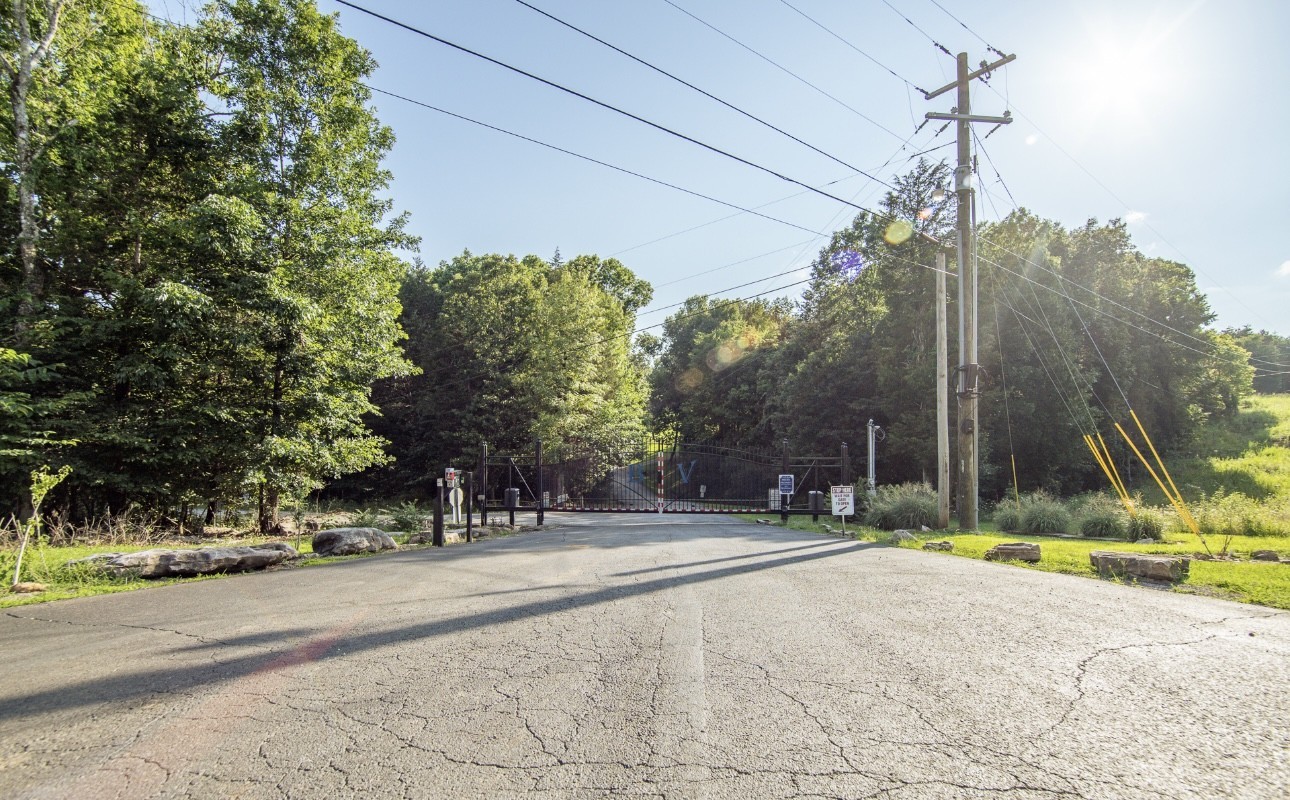 1085 WC PICKETT Road Clifton, TN 38425 - Photo 51 of 72 a view of a building with a park
