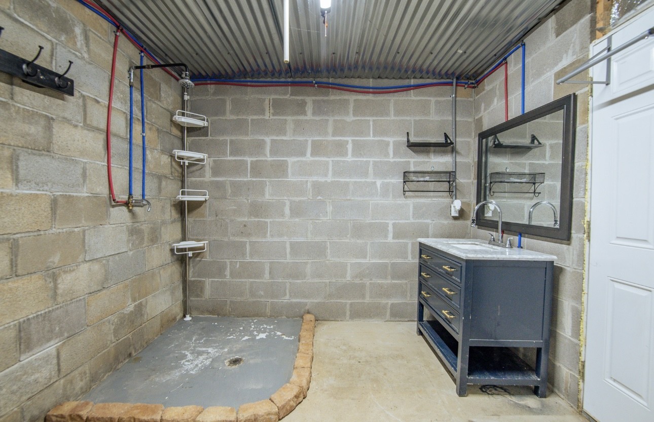 1085 WC PICKETT Road Clifton, TN 38425 - Photo 54 of 72 a bathroom with a tub and shower