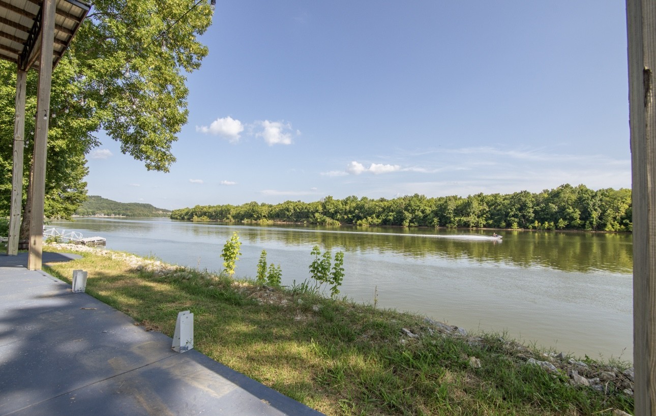 1085 WC PICKETT Road Clifton, TN 38425 - Photo 55 of 72 a view of a lake with a city