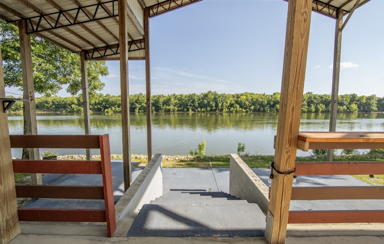 1085 WC PICKETT Road Clifton, TN 38425 - Photo 69 of 72 a house with lake view